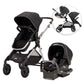 Modular travel stroller with black canopy and matching infant car seat, front view