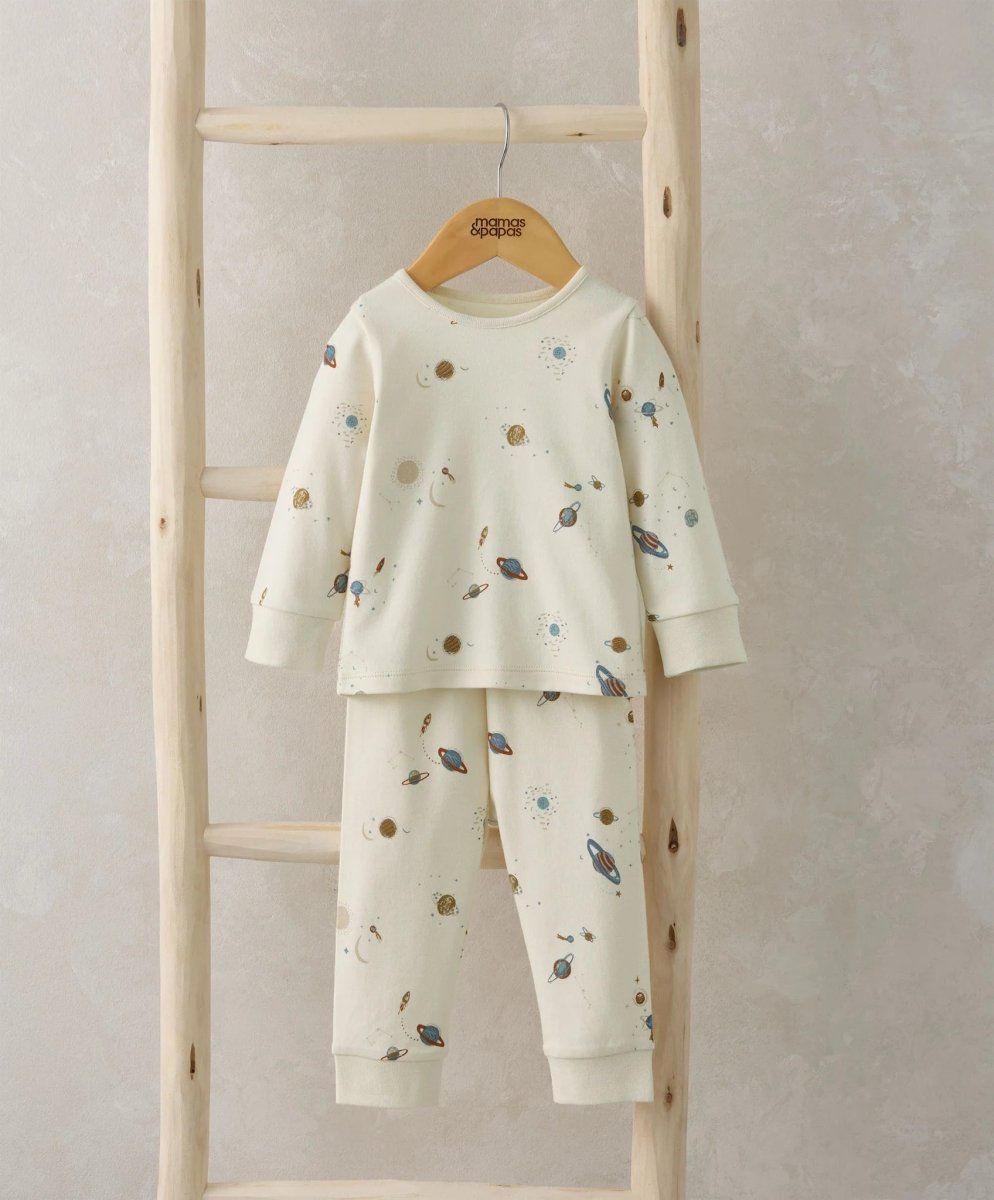 Kids' planet-print pajama set with long sleeves and matching trousers