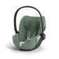 Leaf green i-Size car seat with padded insert, side view with carry handle