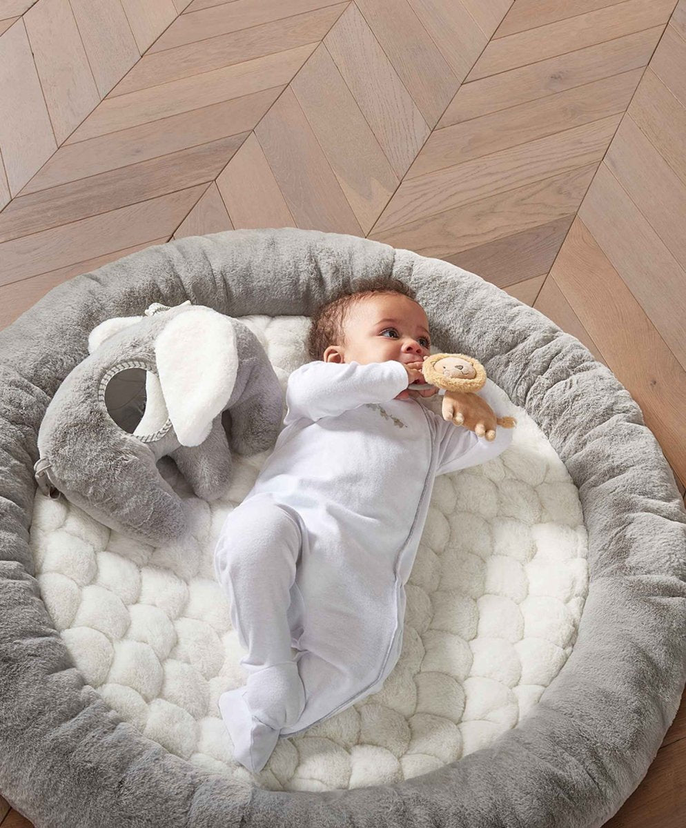 Elephant playmat gym with gray cushioned play surface and plush elephant for baby play