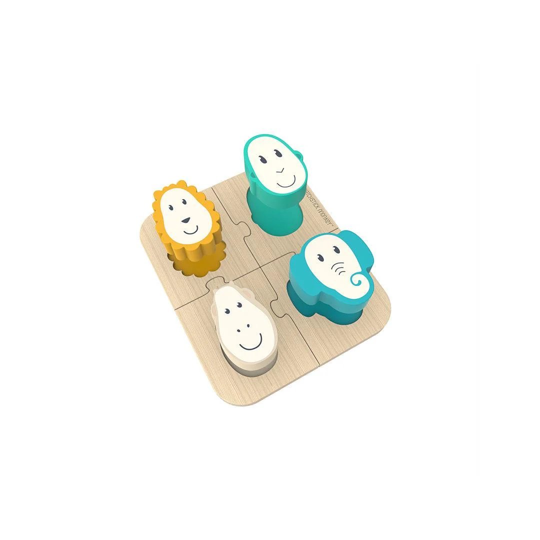 Wooden animal puzzle game with smiling animal face pieces on base