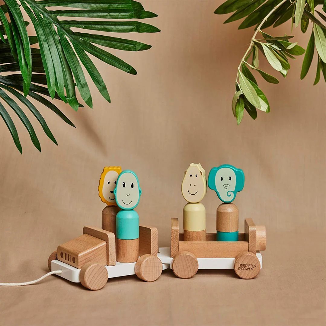 Wooden safari jeep toy with animal-face posts and wooden wheels