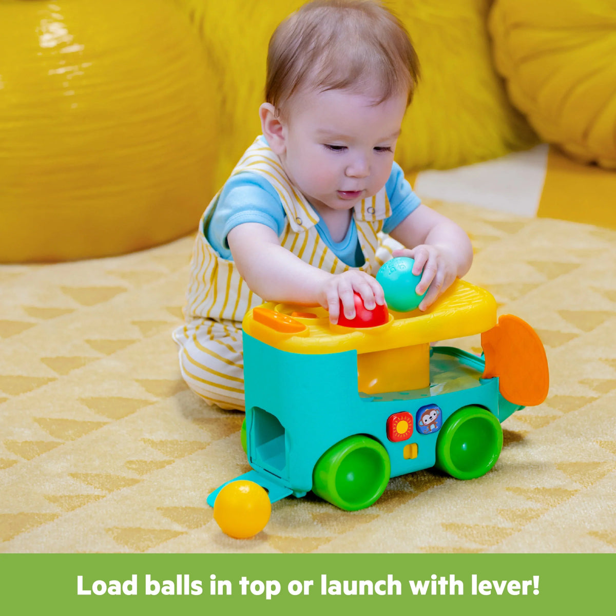 Ball pop bus toy with lever top, teal trunk and three colorful balls