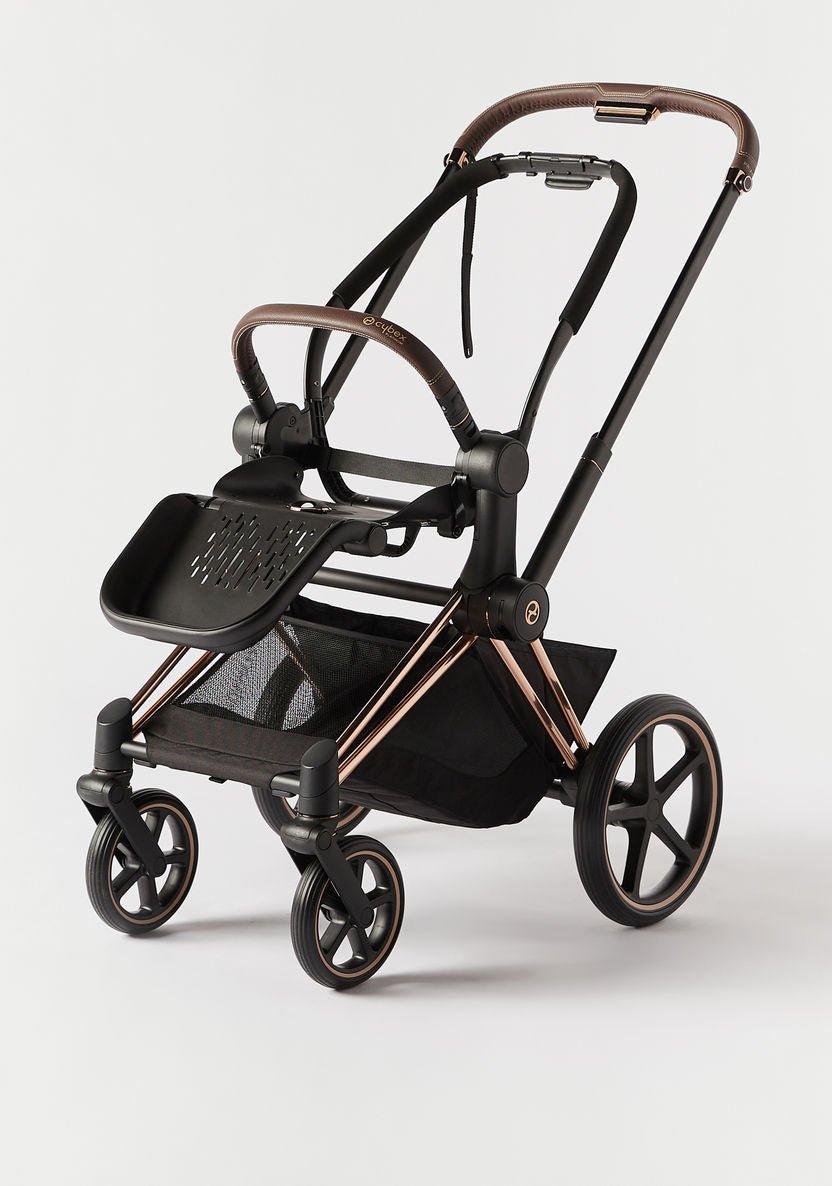 Stroller with black seat, dark tray, rose-gold frame accents, and front wheels