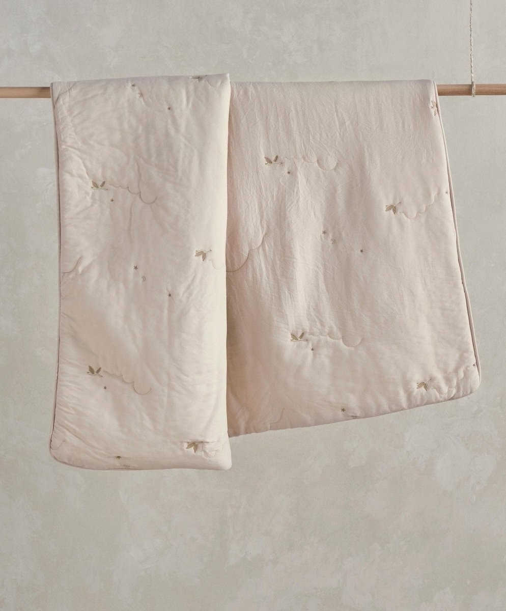 Soft taupe baby quilt, two folded panels with tiny stitched star motif details