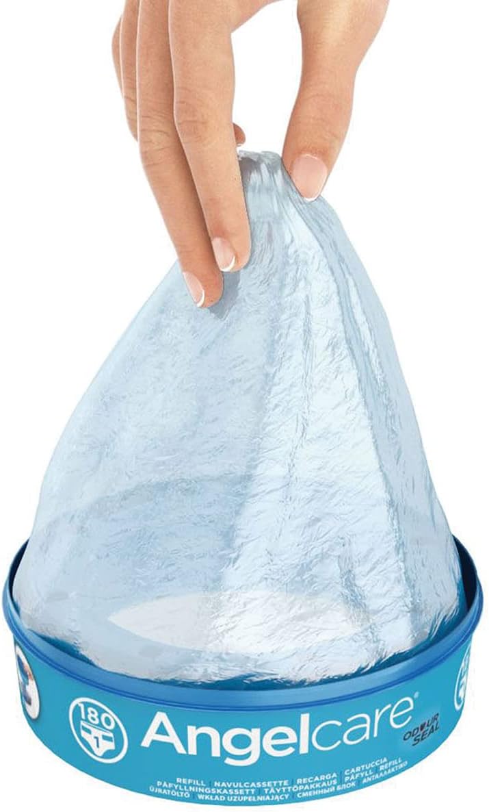 Angelcare refill cassettes, blue-lidded cartridges with open top, held by hands