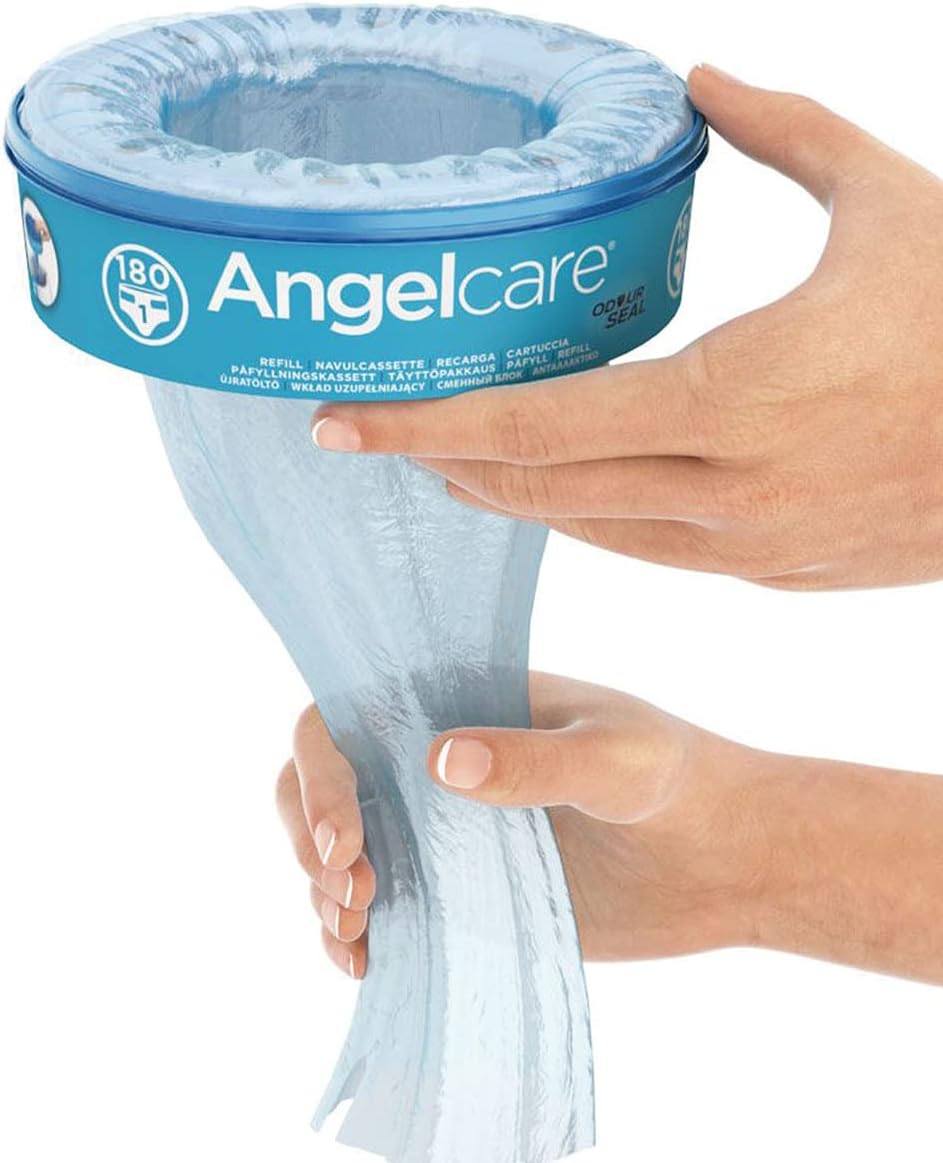 Angelcare refill cassette with pale blue insert, hands holding cartridge open