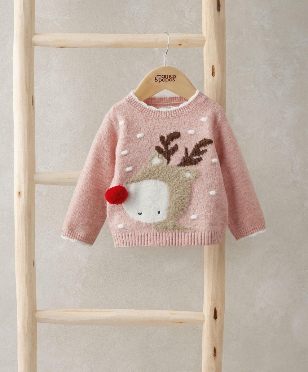 Reindeer Christmas jumper in dusty pink, full front view with pom-pom and knit pattern