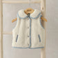 Cream borg fleece gilet with blue trim, zip front, side pockets