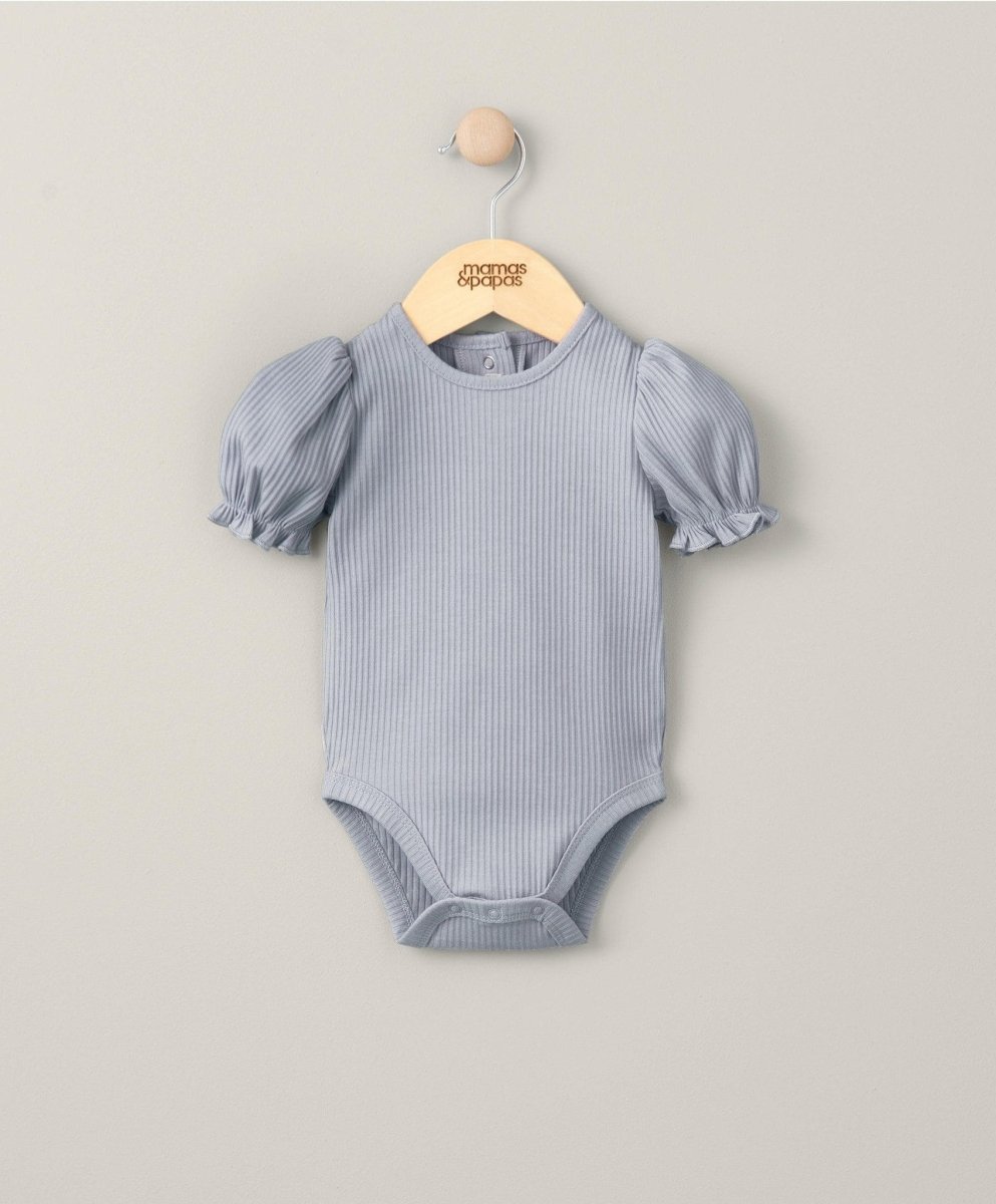 Heather blue ribbed bodysuit with short puff sleeves and snap-button crotch