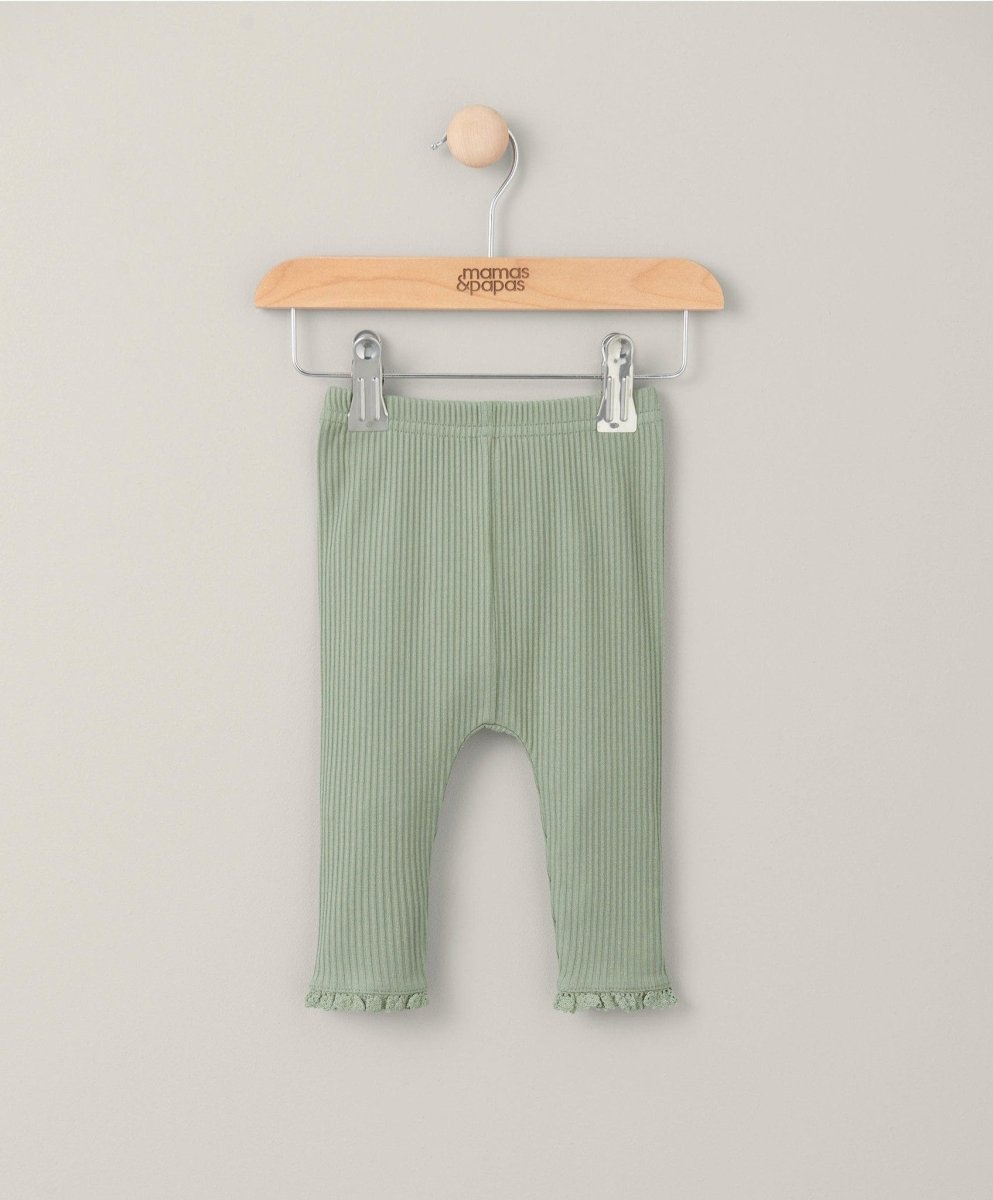 Ribbed green leggings with elastic waistband and ankle length