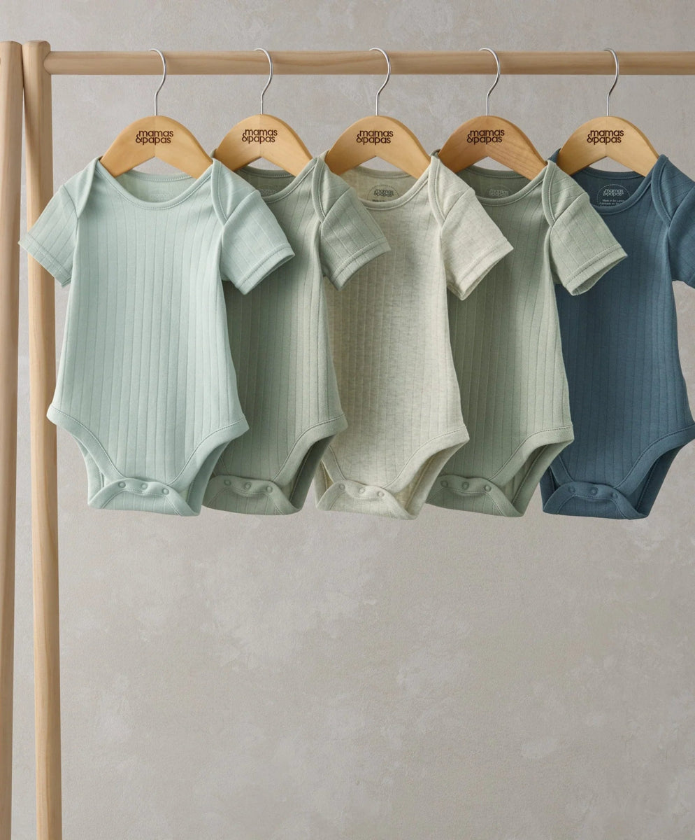 Ribbed short-sleeve bodysuits set (5) on hangers, mint, cream, and blue shades