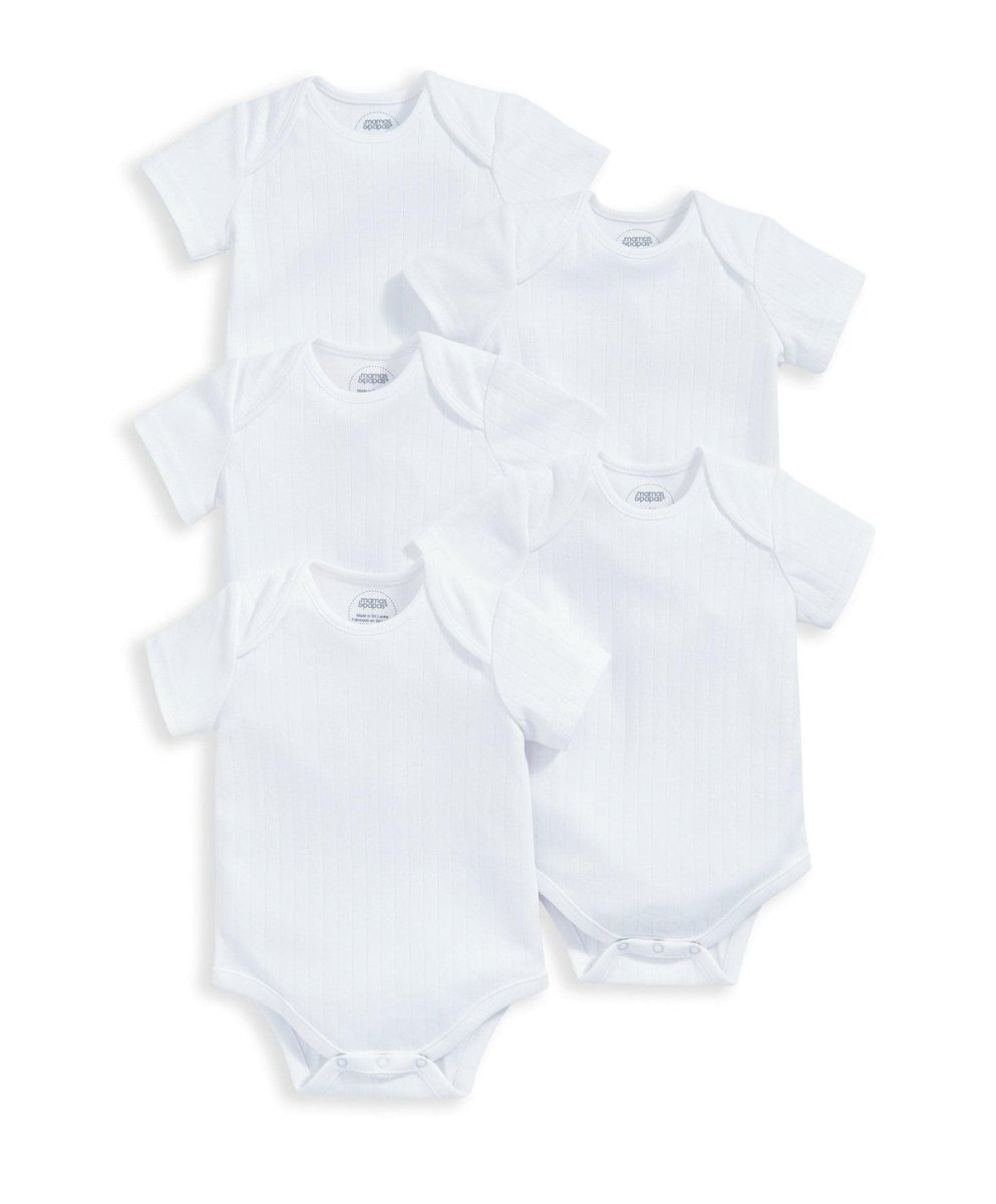 Set of 5 white ribbed short-sleeve bodysuits in a flat lay, snap closures