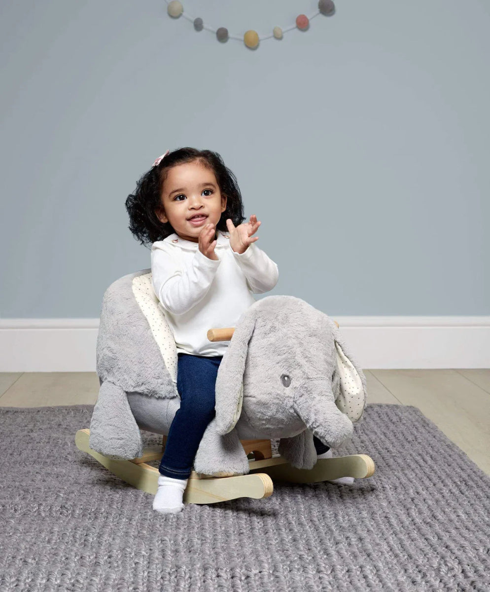 Plush gray elephant rocking animal with cushioned seat on wooden rockers