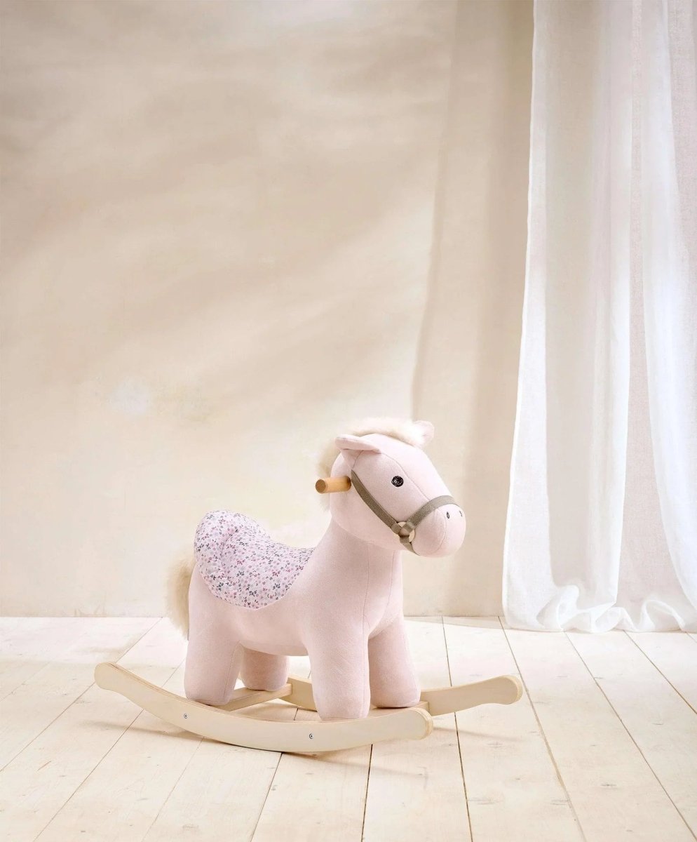 Plush rocking horse with pale pink body, speckled mane, wooden rockers, Belle style