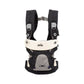Black baby carrier with cream headband, gray insert panel, adjustable shoulder straps