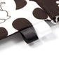 Cloth sensory book cover detail with black fabric strap and stitched ribbon