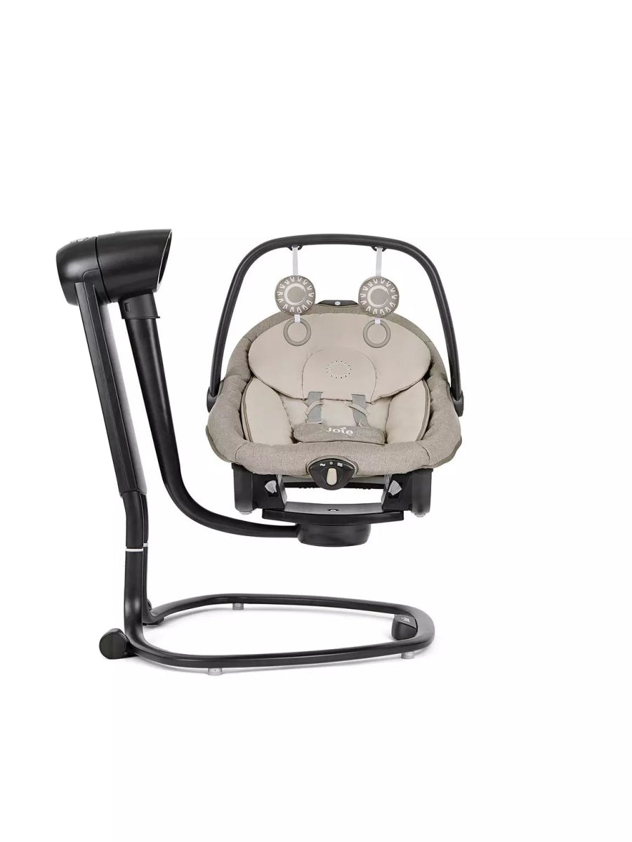 2-in-1 swing rocker infant seat side view, speckled beige cushion with toy bar