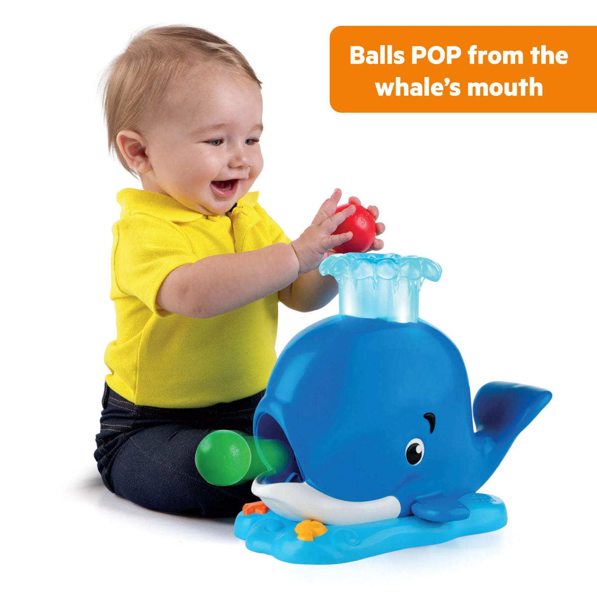 Blue whale ball popper toy with light-up spout and colorful pop-out balls