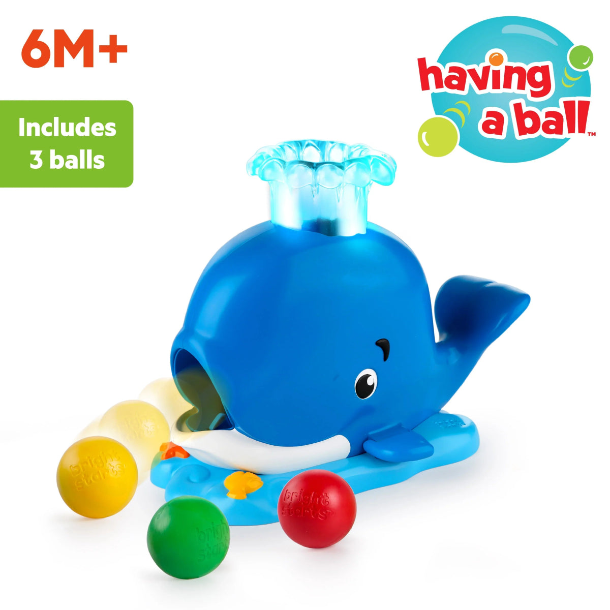 Blue whale ball popper toy with light-up spout and three included colorful balls