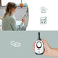 Baby monitor adapter in hand, white body with dark top and oval status display