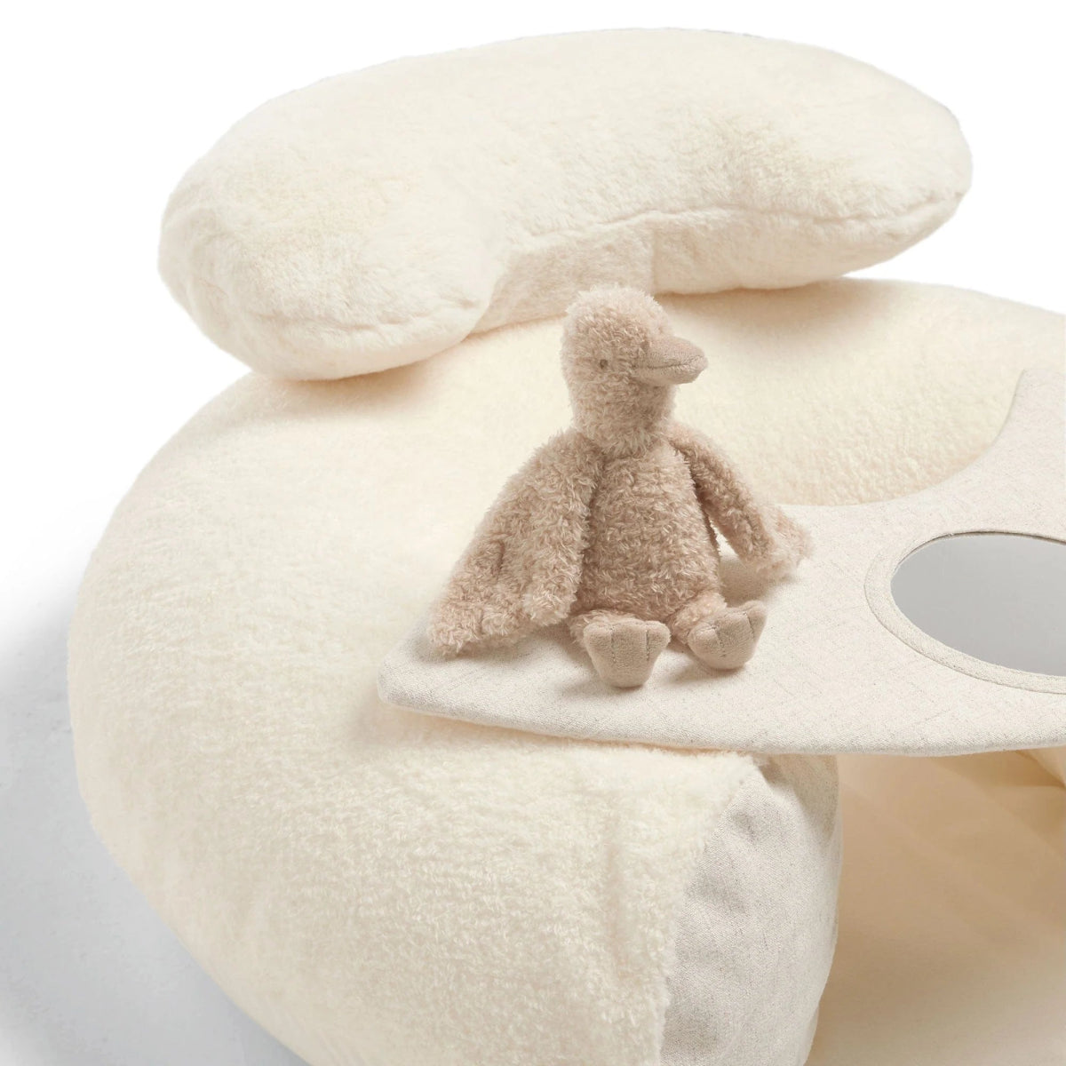 Cream plush duckling sit-and-play seat with beige dangling figure and side play opening
