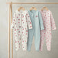 Newborn sleepsuit set of 3: white floral print footed long-sleeve onesie.