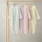 Newborn sleepsuit set of 3: white with lemon print, pale pink, pale yellow