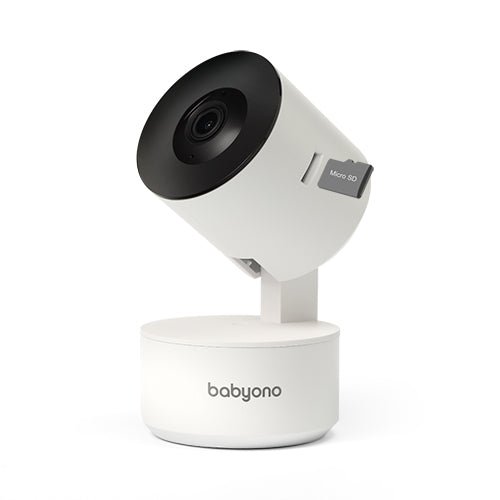 Baby monitor smart camera on white base, black lens dome, front view.