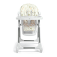 Highchair with light printed fabric seat and back and white tray, gray legs