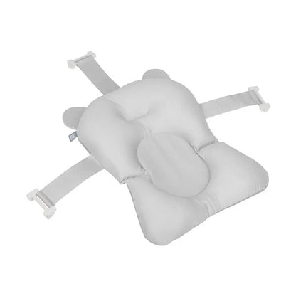 Light grey plush bear bath support cushion with two adjustable straps