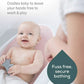 Pink baby bath support with soft-touch perforated insert and curved cradle for newborns