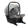 ISOFIX car seat angled view, gray canopy, black shell, and safety bar
