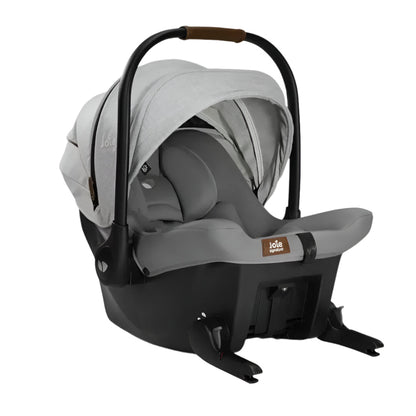 ISOFIX car seat angled view, gray canopy, black shell, and safety bar