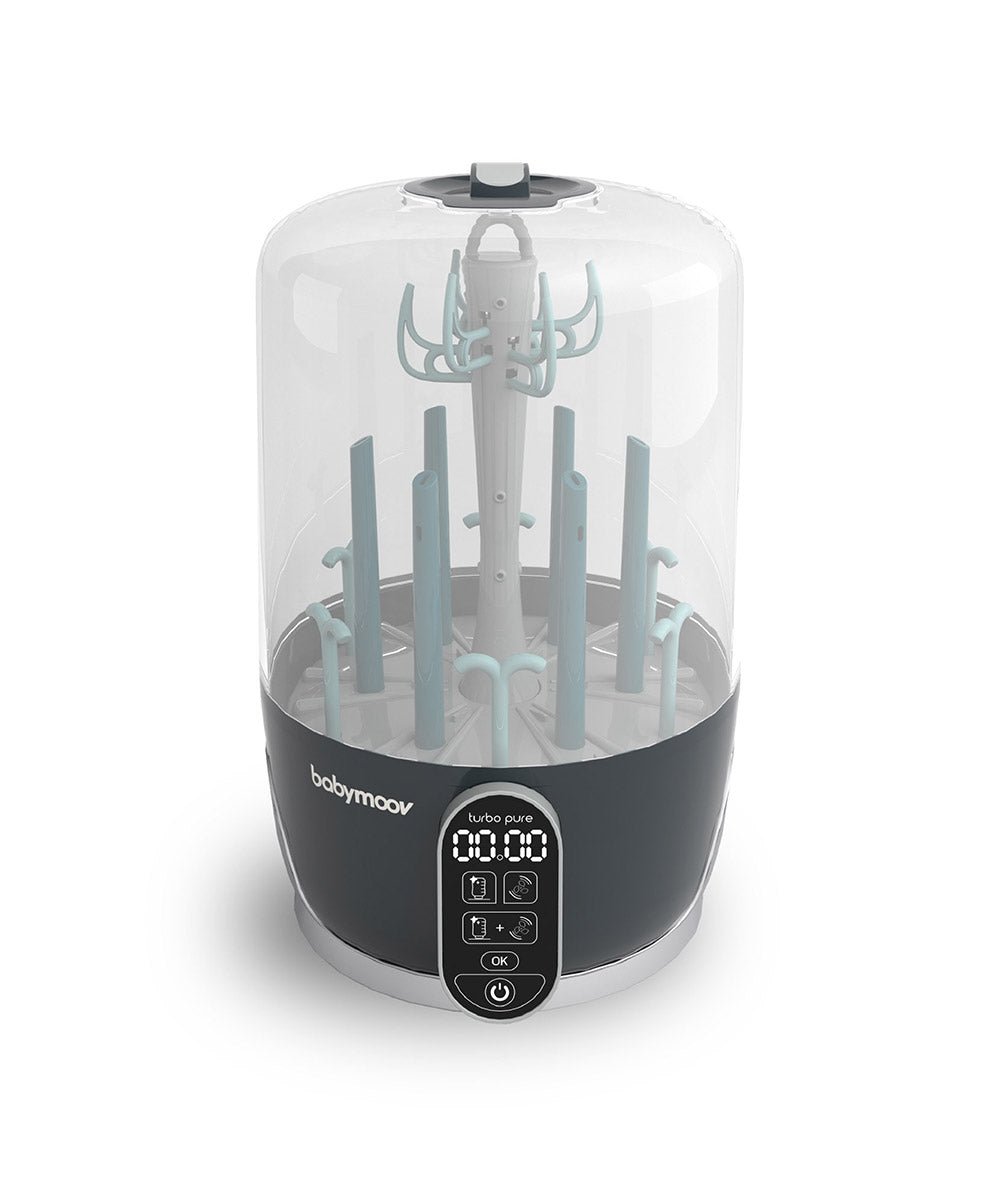Steam sterilizer and dryer with clear dome lid, teal bottle rack, and front digital control panel
