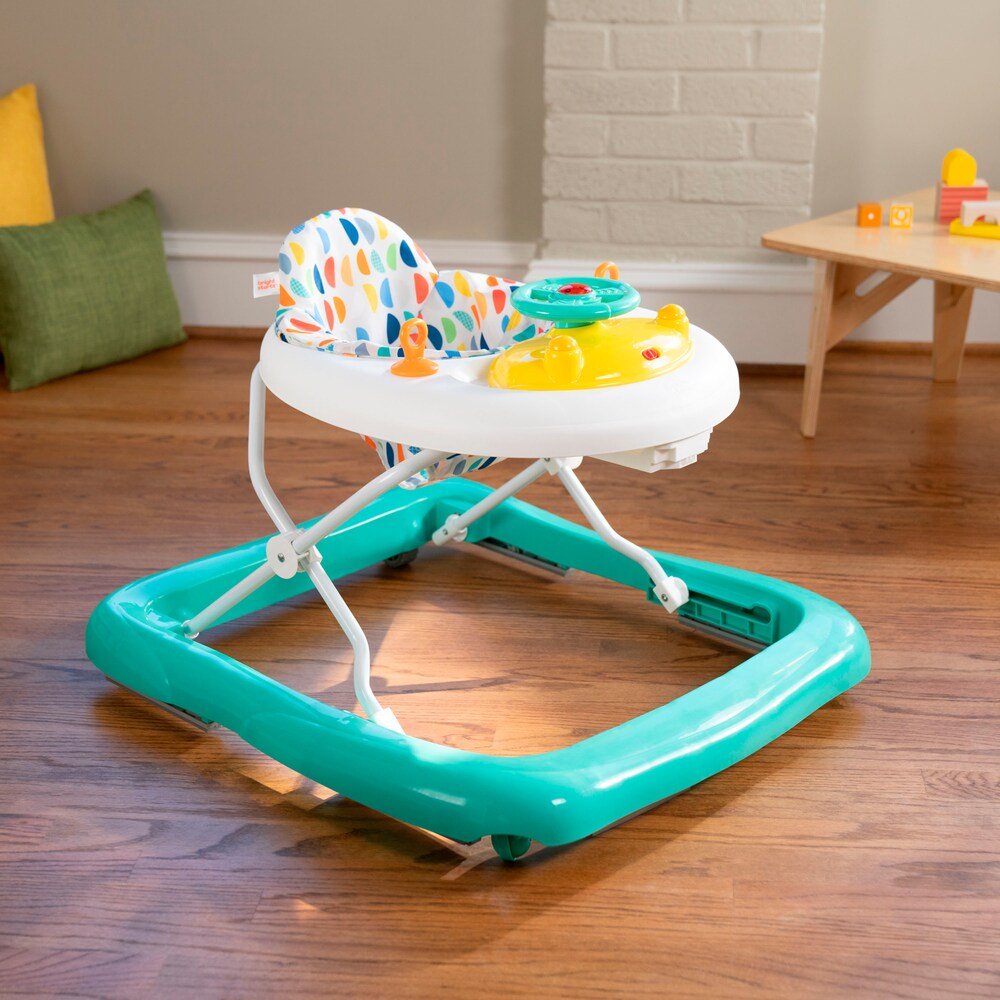 Teal activity walker base with white seat and colorful patterned play tray