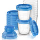 Stacked plastic storage containers with blue lids, one lid on a clear container