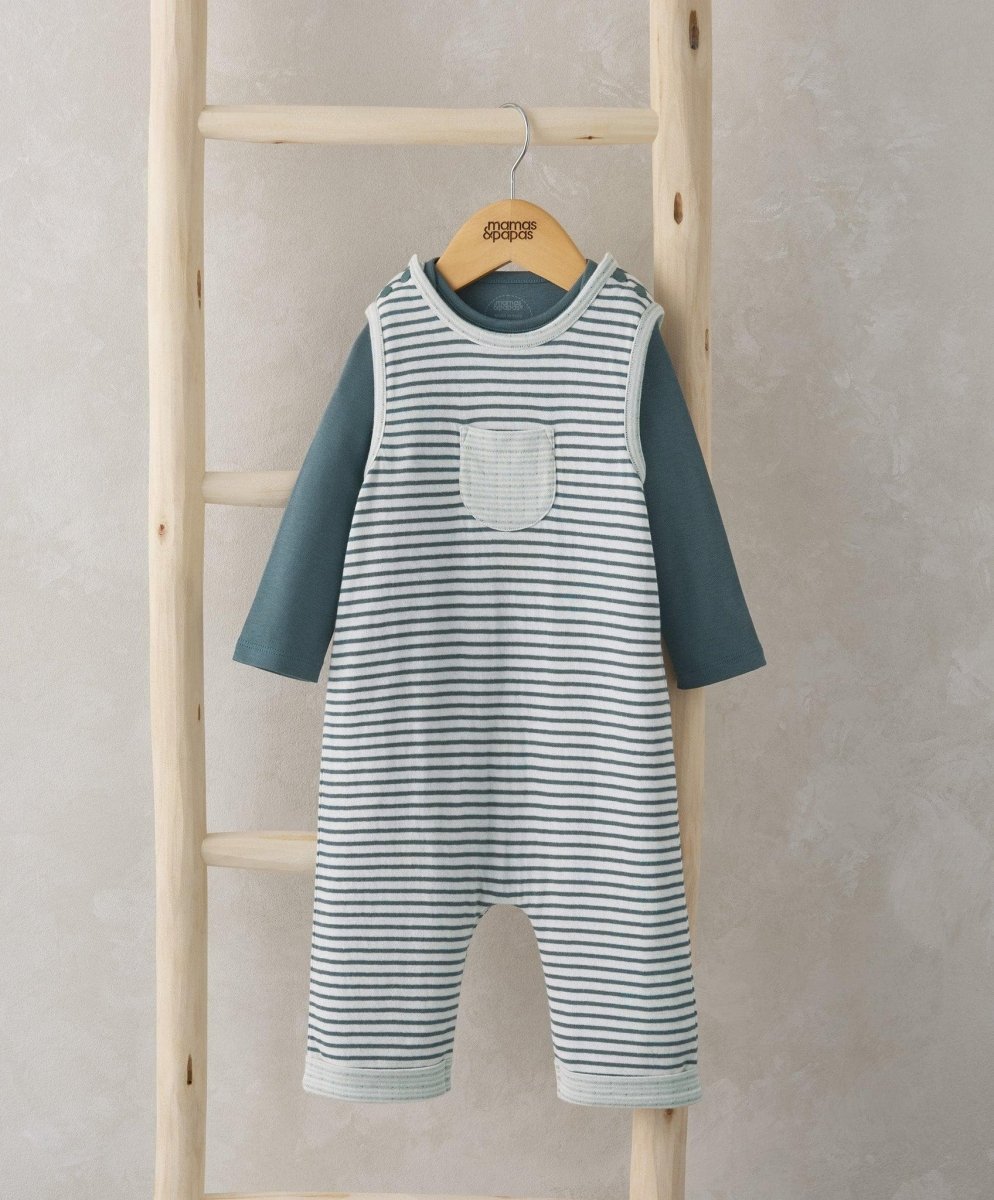 Striped baby dungarees romper with navy sleeves and front pocket, snap bodysuit