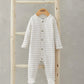 Striped long-sleeve baby sleepsuit with button placket and footed cuffs, front view