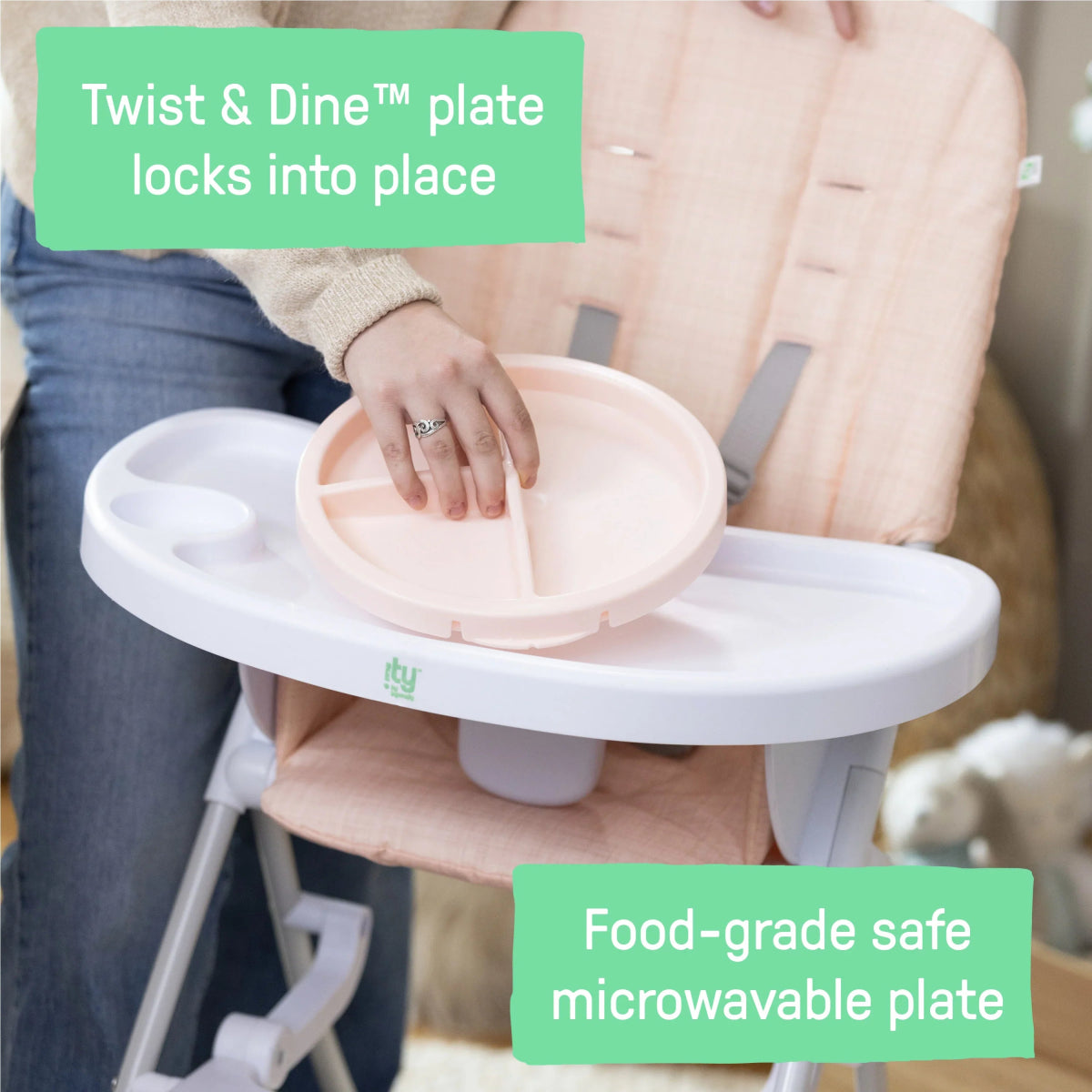 Blush high chair tray with round plate insert and divider sections.