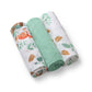 Set of muslin baby diapers with leaf and woodland animal prints, solid green center