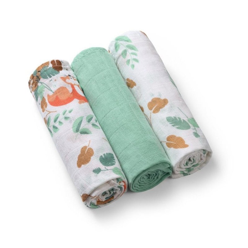 Set of muslin baby diapers with leaf and woodland animal prints, solid green center