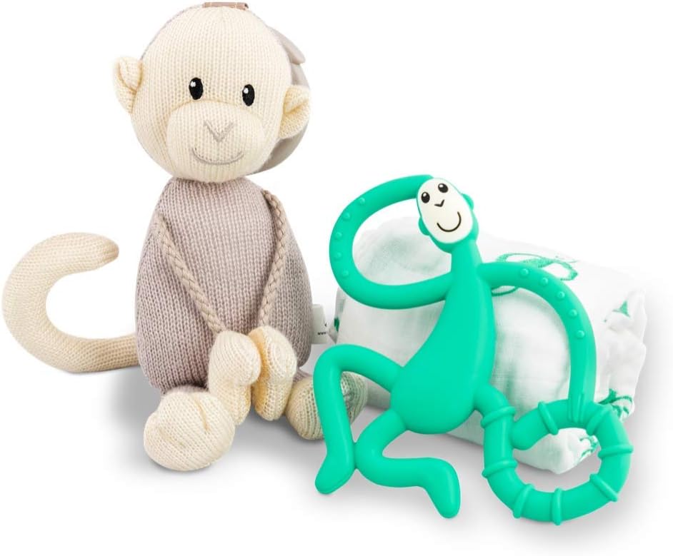 Baby teething gift set with plush gray monkey, green teether, and white muslin blanket