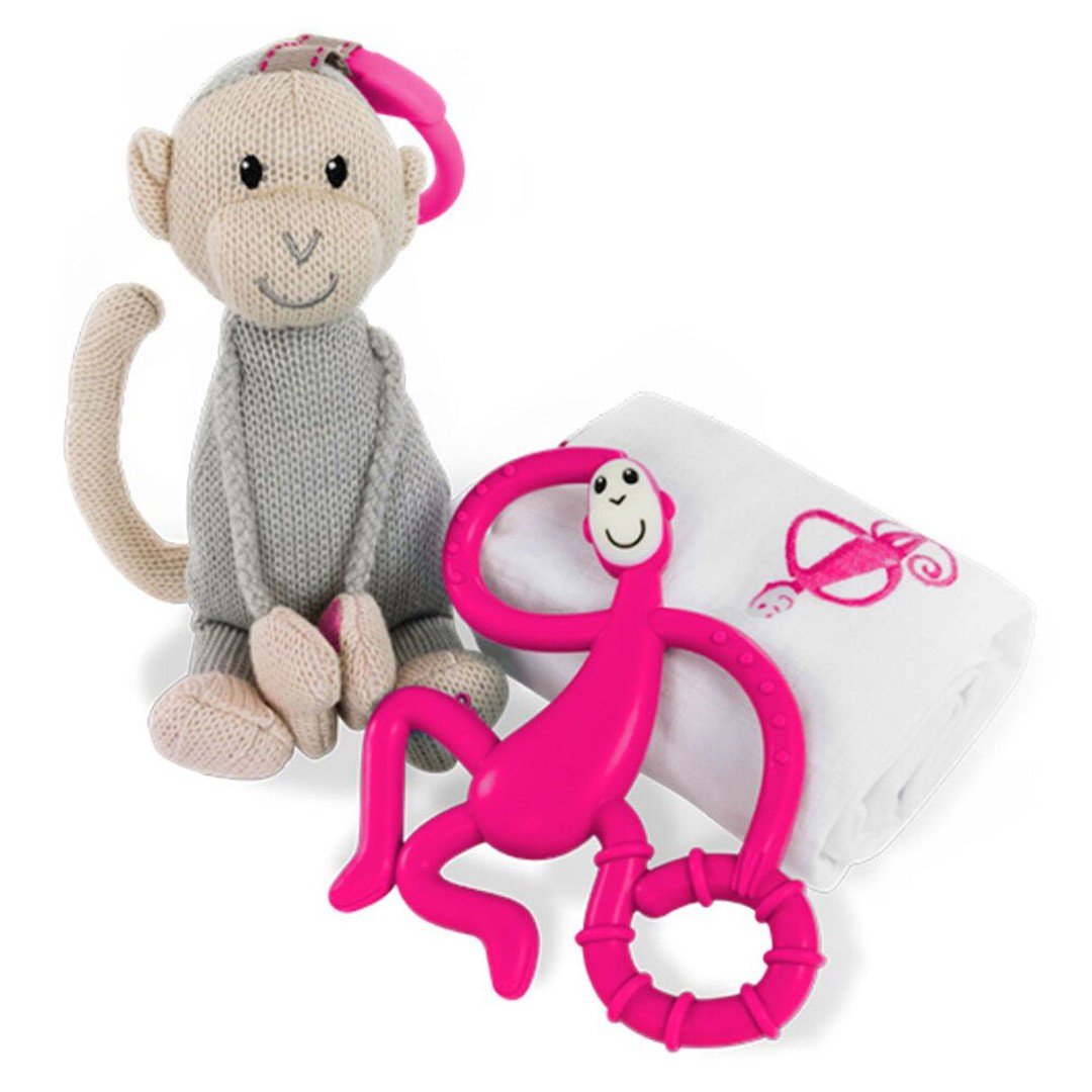 Baby teething gift set with plush gray monkey, pink teether, and white muslin blanket