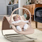 Baby rocker and bouncer with toy bar rings, tan seat, baby lying back