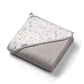Hooded terry towel with pastel animal-and-balloons print and light gray terry backing