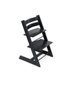 High chair in black wood with two-tier seat and arched backrest