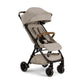 Hazelwood TRVL compact stroller with canopy and tray in beige fabric
