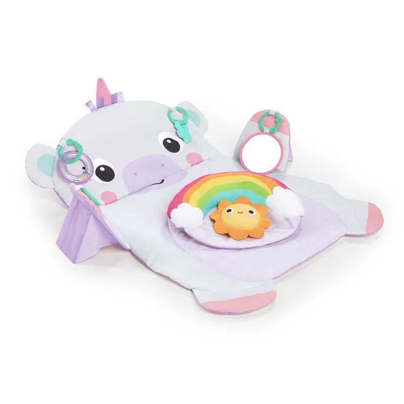 Unicorn play mat with tummy-time cushion, rainbow arch, and hanging toy rings