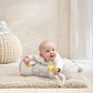 Tummy time roll with cloud print and yellow star, gray base with ring handle